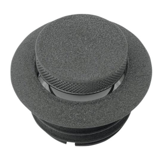 Close-up of the Pop-Up Gas Cap - Vented - Black by Moto Iron®, showcasing its round, textured billet aluminum structure with a central circular design and a vented mechanism.