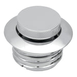 Two round flush gas caps—one matte black and one chrome—from Moto Iron®, with an inset image showing the black Pop-Up Gas Cap - Vented installed on a yellow motorcycle.