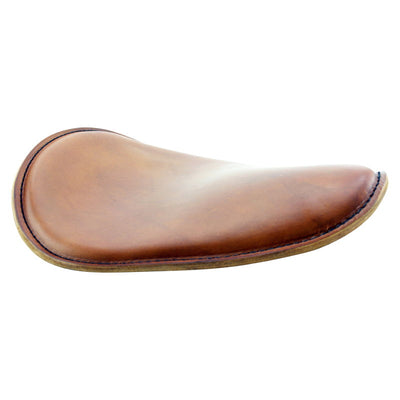 A Rich Phillips Leather brown leather-covered saddle on a white background.