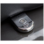 A close up of a car key with a Saddlemen - ATAB Security Seat Screw - Chrome on it, providing security.
