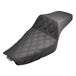 The Saddlemen Step-Up Seat for 2004-2022 Harley-Davidson Sportster (2.2/3.3 gal tank) features diamond-patterned black stitching, a raised rider section, and lower passenger area for enhanced lumbar support.