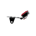 A black and red TC Bros. Maltese Cross Side Mount Tail Light/License Plate Bracket on a white background, featuring a versatile bracket for side mount license plate.