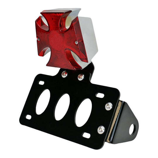 A TC Bros. Maltese Cross Side Mount Tail Light/License Plate Bracket, a versatile side mount license plate bracket with a tail light included and the TC Bros. brand's distinctive red cross on it.