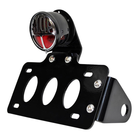 A TC Bros. "Stop" Bobber Side Mount Tail Light/License Plate Bracket with a versatile bracket.