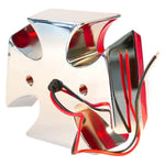 A TC Bros. Maltese Cross Tail Light with wires and a chrome die cast housing.