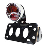 TC Bros. motorcycle enthusiasts can enhance their ride with a TC Bros. "Stop" Model A side mount license plate bracket. This innovative TC Bros. tail light bracket provides both style and functionality, keeping your license plate securely in place while riding a Harley-Davidson motorcycle.