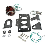 A versatile TC Bros. "Stop" Model A Side Mount Tail Light/License Plate Bracket for a motorcycle with a red tail light.