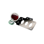 A TC Bros. red light mounted on a TC Bros. 33 Ford Replica Side Mount Tail Light/License Plate Bracket.