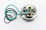 A small metal device with wires attached to it, the TC Bros. Ford Duolamp Model A Stainless Steel Tail Light functions as a brake/running light.