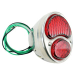 Three TC Bros. Duolamp/Model A Tail Lights: all with chrome housings; one features a black lens, one has red lenses, and one classic Model A style displays "STOP" in red.