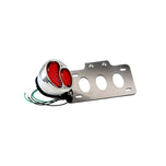 A TC Bros. LED Model A Side Mount Tail Light/License Plate Bracket motorcycle tail light.