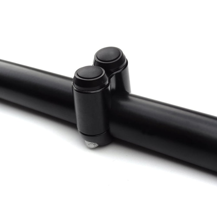 A Motone black tube with two momentary buttons on it.