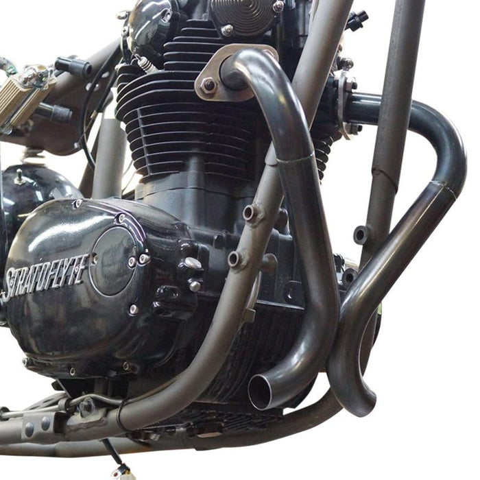 A close up of a black engine motorcycle with a custom Pandemonium "Double D" Exhaust System by Pandemonium.