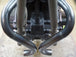 A close up of a motorcycle engine with Yamaha XS650 "Double D" Exhaust System by Pandemonium custom pipes and Pandemonium exhaust pipes.