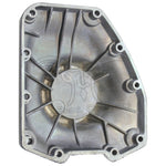 The Mid-USA Cam Cover for 2001-2017 Harley-Davidson Twin Cam features a black metal design with multiple bolt holes and a central raised circular section accented by a silver metallic component.