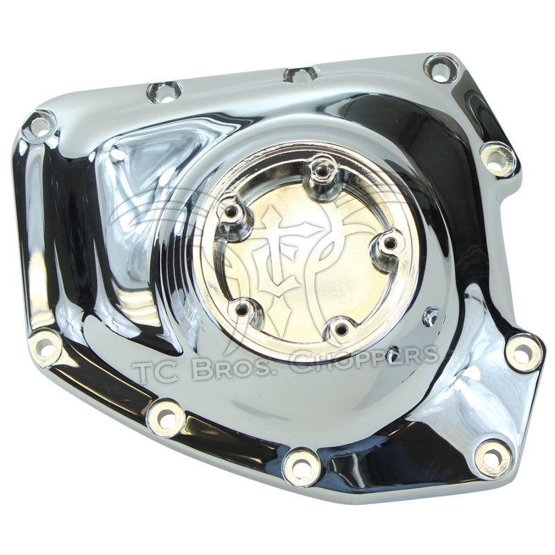 Mid-USA Cam Cover for 2001-2017 Harley-Davidson Twin Cam, chrome finish with multiple bolt holes, shown on a white background.
