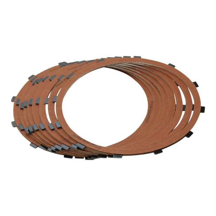 A stack of Alto Clutch Friction Discs for 1971 to E1984 Harley-Davidson Sportster, featuring brown discs with black rectangular tabs arranged in an overlapping circular pattern, by Alto Products.