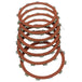 A set of Alto Clutch Friction Discs for L1984-1990 Harley-Davidson Sportster, by Alto Products, is arranged in a slightly fanned-out formation to showcase the components of a wet clutch system.