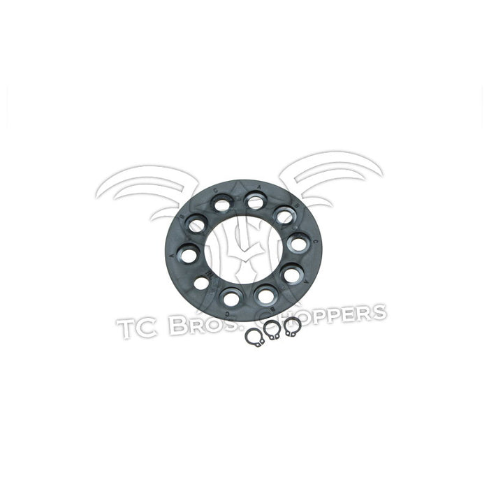 The Mid-USA Clutch Hub Basket Retainer Kit for 1941-E1984 Harley-Davidson Big Twin features a circular metal part with multiple holes and two small clips—ideal for clutch upgrades or basket retainer kit replacements.