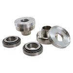 Five metal mechanical components from the TC Bros. 1" Steering Cup Conversion Bearing Kit for Harley-Davidson are arranged on a plain white background—ideal for upgrading your Sportster.