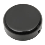 A round, black plastic object with a smooth, glossy finish and a small hole on its side—this Moto Iron® Steering Stem Bolt Cover for Harley-Davidson 39mm Narrowglide is photographed on a white background.