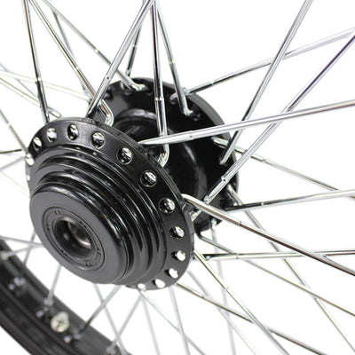 A close up of a black spoked Moto Iron® Harley FX and Sportster wheel with a Billet Hub on a white background.
