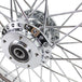 A close up image of a Moto Iron® chrome front wheel with 40 spokes on a motorcycle.