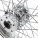 The Moto Iron® Complete 16 x 3 Rear Wheel for 1979-1999 Harley-Davidson features a triple chrome-plated finish and multiple spokes, viewed from the side against a white background.