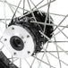 The Moto Iron® Complete 16 x 3 Rear Wheel for 1979-1999 Harley-Davidson features a black sealed rim, silver hub, and chrome spokes—offering a classic look for your Big Twin.