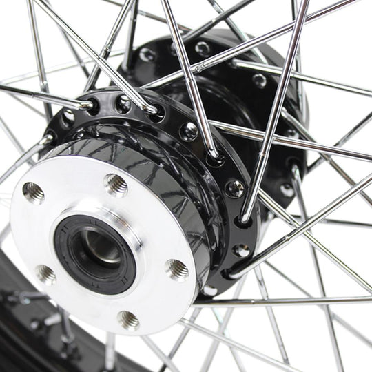 The Moto Iron® Complete 16 x 3 Rear Wheel for 1979-1999 Harley-Davidson features a black sealed rim, silver hub, and chrome spokes—offering a classic look for your Big Twin.