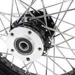 The Moto Iron® 16” × 3” rear wheel fits 2000-2007 Harley-Davidson Big Twin and Sportster models, shown in chrome and black finishes with a durable spoked design.