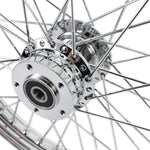 A Moto Iron® 21” × 2.15” chrome front wheel for 2000-2006 Harley-Davidson Big Twin, featuring classic spokes and a central hub, is shown side-on against a white background.