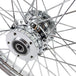 A close up image of a Moto Iron® Chrome Front 40 Spoke Wheel 21"x2.15" (fits Harley Softail 2000-2006, Dyna FXDWG 2000-2005) on a Harley Softail.
