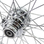 A Moto Iron® 21” × 2.15” chrome front wheel for 2000-2006 Harley-Davidson Big Twin, featuring classic spokes and a central hub, is shown side-on against a white background.