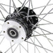 A close up of a Moto Iron® Black Front 40 Spoke Wheel 21"x2.15" (fits Harley Softail 2000-2006, Dyna FXDWG 2000-2005).