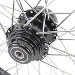 A close up of a Moto Iron® Black Front 40 Spoke Wheel 21"x2.15" (fits Harley Softail 2000-2006, Dyna FXDWG 2000-2005) on a white background.
