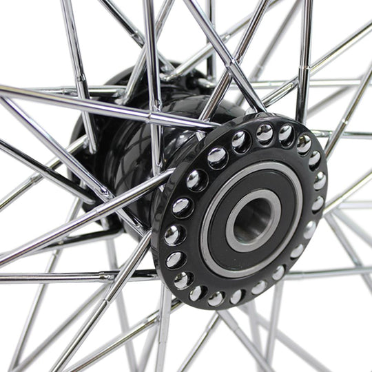 The Moto Iron® 40 spoke 21 x 2.15 Chopper Spool Wheel features a black finish, metal spokes, and a sturdy central hub with a sealed rim design for enhanced durability and style, all viewed from the side against a white background.