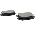 Two black Yamaha XS650 Brake Pads on a white surface.