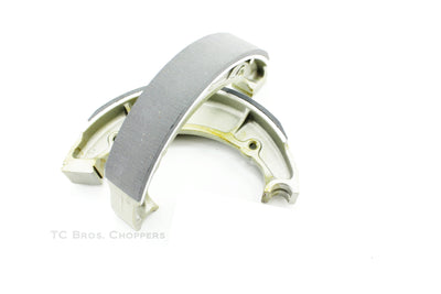 A pair of Moto Iron® Yamaha XS650 Rear Drum Brake Shoes that fits the Yamaha XS650 on a white background.