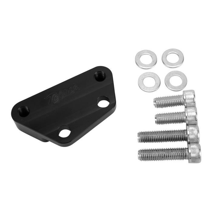 Description: A black metal bracket with three holes, similar to the TC Bros. Black Axial Brembo Front RH Bracket 2000-2017 Harley Stock Rotor, accompanied by four screws and bolts, and four washers displayed to its right.