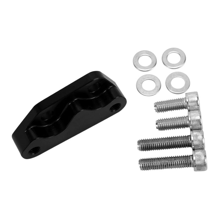 A black metal bracket, compatible with the TC Bros. Black Axial Brembo Front LH Bracket for 2008-2017 Harley 12.6in Rotors, comes with four washers and four screws arranged next to it.