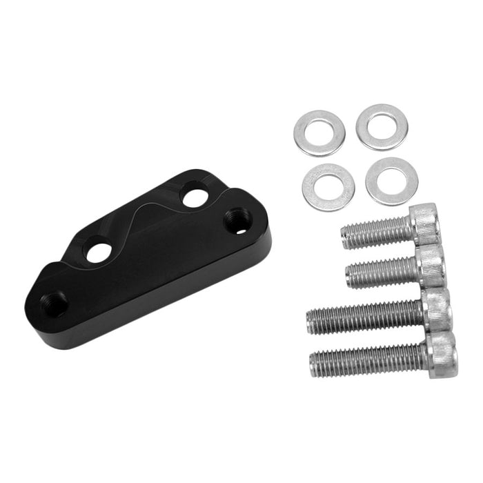 A black metal bracket, compatible with the TC Bros. Black Axial Brembo Front LH Bracket for 2008-2017 Harley 12.6in Rotors, comes with four washers and four screws arranged next to it.