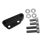 The TC Bros. Black Axial Brembo Front RH Bracket for 2008-2017 Harley models with a 12.6in rotor is pictured on a white background, featuring two mounting holes and accompanied by four bolts and washers. Ideal for upgrading your Harley's brakes.