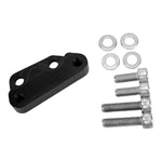 The TC Bros. Black Axial Brembo Front RH Bracket for 2008-2017 Harley models with a 12.6in rotor is pictured on a white background, featuring two mounting holes and accompanied by four bolts and washers. Ideal for upgrading your Harley's brakes.