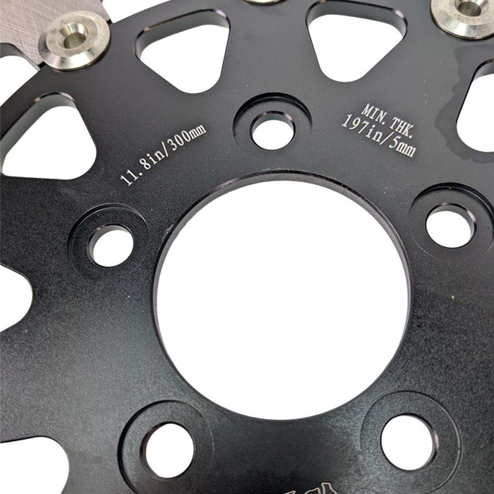 The TC Bros. 11.8in Rear Floating Brake Rotor is designed for 2008-up Harley Touring Bagger models, featuring a round design with a black center and silver perforated outer edge.