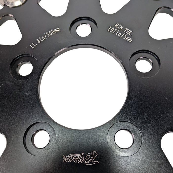 The TC Bros. 11.8in Profile™ Rear Floating Brake Rotor, designed with circular holes and a wave-like edge, features a black center. It&