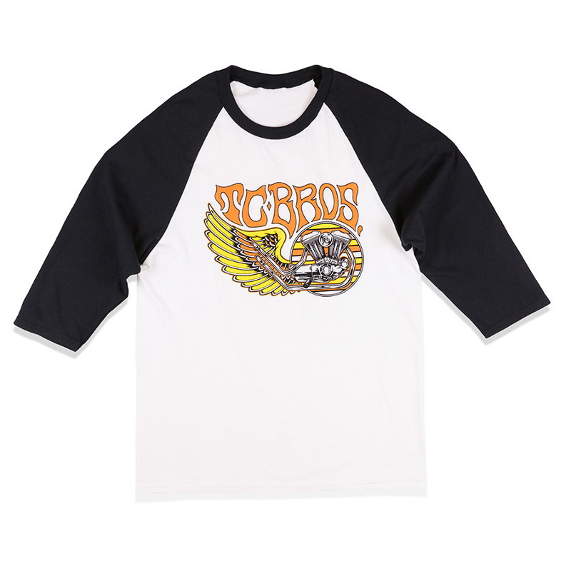A white and black TC Bros. Wing Raglan pre-shrunk t-shirt with an image of a motorcycle.
Product: TC Bros. Wing Raglan - White/Black
Brand: TC Bros.
