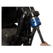 A person is using a Motion Pro Steering Bearing Race Install/Removal Tool to hold a blue hose on a Harley Davidson motorcycle.