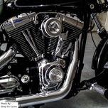 The TC Bros. Chrome Louvered Air Cleaner Kit for Harley-Davidson CV and EFI includes a chrome louvered cover, red filter element, black mounting plate, screws, and wing nut.