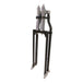 Two Moto Iron® Springer Front Ends for Harley-Davidson frames with 1" necks—one chrome, one black—are displayed side by side with a metal rod and two small parts. Ideal for custom Harley-Davidson springer setups.